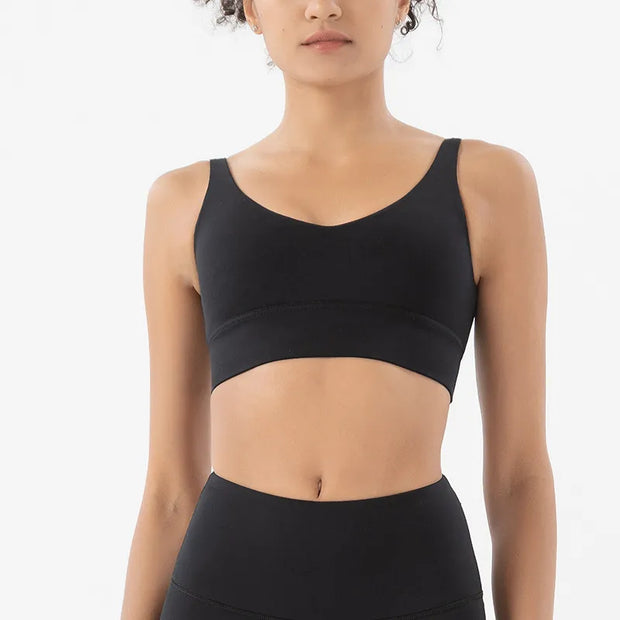 Women Tight Workout Sports Bra with high support and moisture-wicking fabric, designed for comfort and performance during intense workouts and fitness activities.