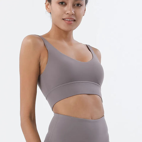 Women Tight Workout Sports Bra with high support and moisture-wicking fabric, designed for comfort and performance during intense workouts and fitness activities.