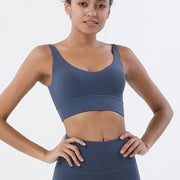 Women Tight Workout Sports Bra with high support and moisture-wicking fabric, designed for comfort and performance during intense workouts and fitness activities.