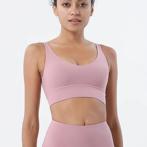 Women Tight Workout Sports Bra with high support and moisture-wicking fabric, designed for comfort and performance during intense workouts and fitness activities.