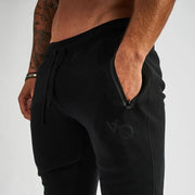 Men's Workout Joggers Sweatpants made from high-quality, moisture-wicking fabric, featuring an athletic fit and drawstring waist for comfort and flexibility during workouts.