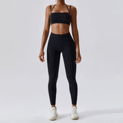 Women's Yoga Activewear Set including a supportive sports bra and high-waist leggings, made from breathable, stretchy fabric for optimal comfort and flexibility during yoga sessions.