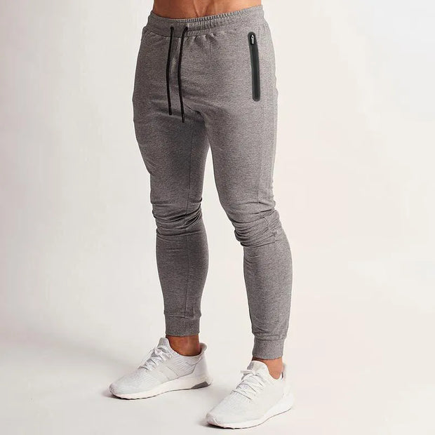 Men's Workout Joggers Sweatpants made from high-quality, moisture-wicking fabric, featuring an athletic fit and drawstring waist for comfort and flexibility during workouts.