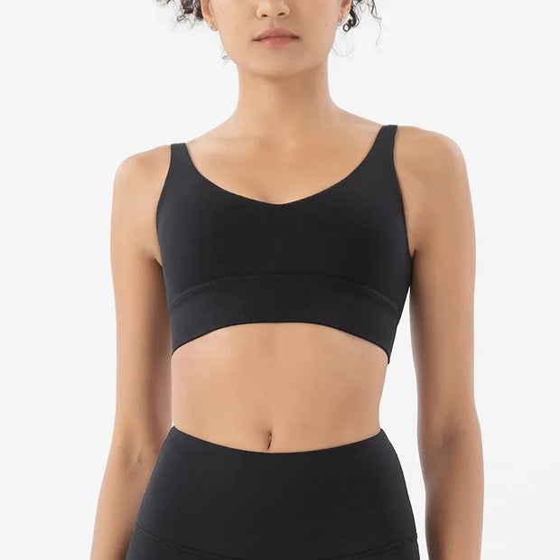 Women Tight Workout Sports Bra with high support and moisture-wicking fabric, designed for comfort and performance during intense workouts and fitness activities.