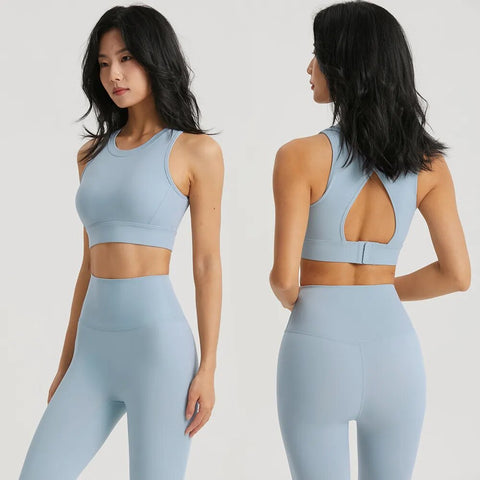 Women Sportswear Yoga Set including a top and leggings, made from breathable, stretchy fabric for maximum comfort and flexibility during yoga and fitness sessions.