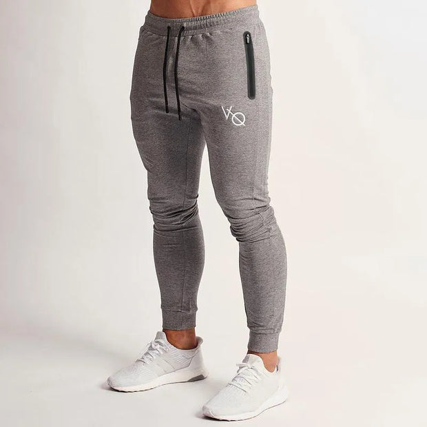 Men's Workout Joggers Sweatpants made from high-quality, moisture-wicking fabric, featuring an athletic fit and drawstring waist for comfort and flexibility during workouts.