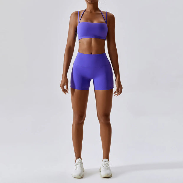 Women's Yoga Activewear Set including a supportive sports bra and high-waist leggings, made from breathable, stretchy fabric for optimal comfort and flexibility during yoga sessions.