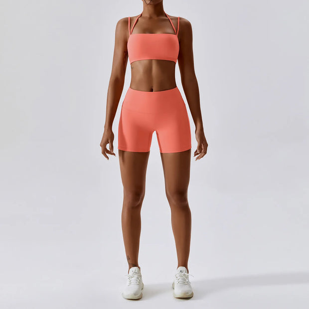 Women's Yoga Activewear Set including a supportive sports bra and high-waist leggings, made from breathable, stretchy fabric for optimal comfort and flexibility during yoga sessions.