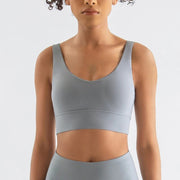 Women Tight Workout Sports Bra with high support and moisture-wicking fabric, designed for comfort and performance during intense workouts and fitness activities.