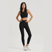 Women Sportswear Yoga Set including a top and leggings, made from breathable, stretchy fabric for maximum comfort and flexibility during yoga and fitness sessions.