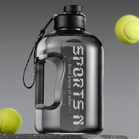 Fitness Large Water Bottle with high capacity, leak-proof design, and easy-carry handle, perfect for staying hydrated during workouts and outdoor activities.